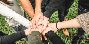 Diverse photo of people all hands in