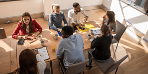 People sitting at a table discussing