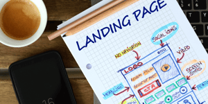 Notepad with landing page notes on it